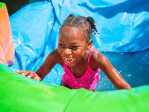Colorful inflatable water slide rental for backyard parties
